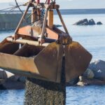 Material Handling in Mechanical Dredging Strategies for Efficient Sediment Removal and Disposal